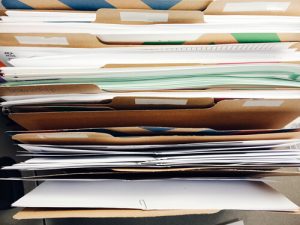 a stack of business documentation 