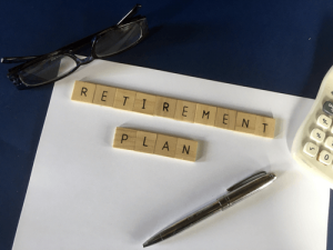 A notepad for taking notes about state-mandated retirement plans.
